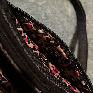 Vera Bradley Stylish Black/blue demin bag set with Leopard Print inside.